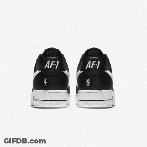 A Pair Of Red And White Nike Air Force 1 Shoes GIF