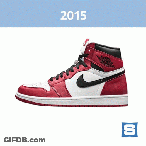 A Pair Of Red And White Nike Shoes With The Year 2015 On The Bottom GIF