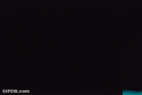 A Pair Of Red White And Black Nike Basketball Shoes GIF