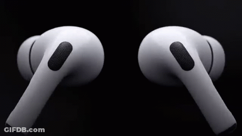 A Pair Of White Apple Airpods Pro Earbuds On A Black Background . GIF