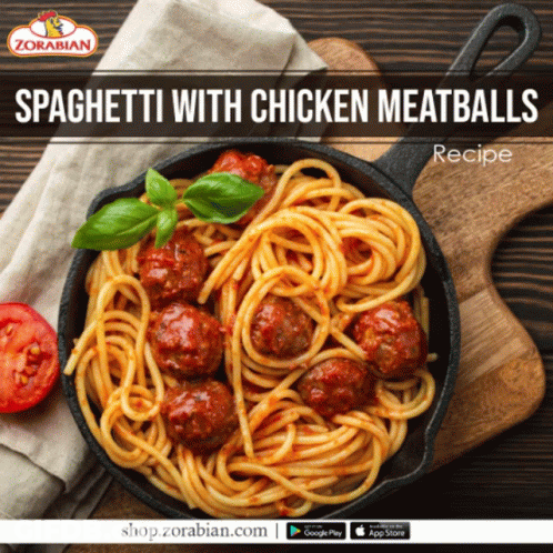 A Pan Of Spaghetti With Chicken Meatballs On A Table GIF