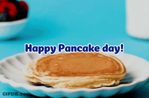 A Pancake On A White Plate With The Words Happy Pancake Day GIF