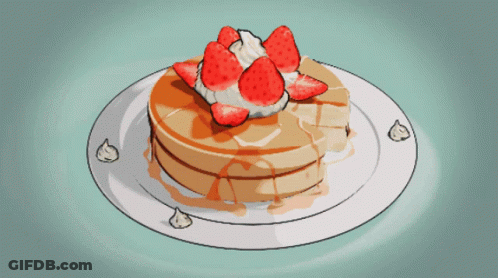 A Pancake With Syrup And Whipped Cream And Strawberries On Top GIF