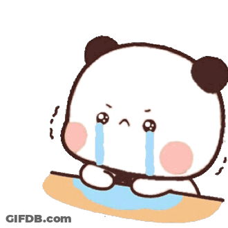 A Panda Bear Is Crying While Sitting On A Table . GIF