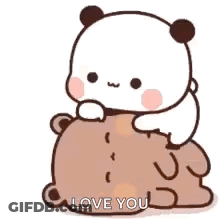 A Panda Bear Is Sitting On Top Of A Brown Teddy Bear . GIF