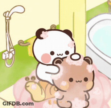 A Panda Bear Is Washing Another Bear In A Bathtub GIF