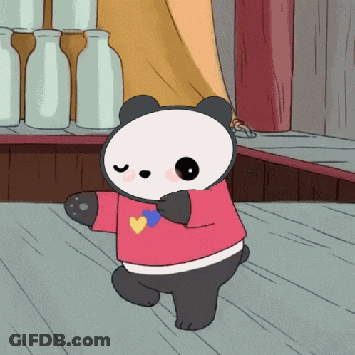 A Panda Bear Wearing A Red Shirt With A Heart On It GIF