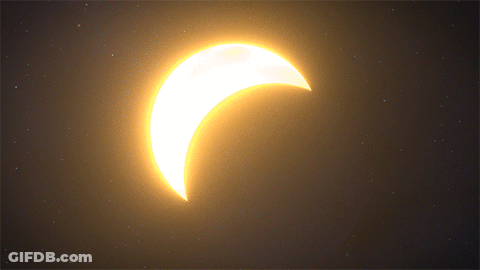 A Partial Eclipse Of The Sun With A Crescent Moon In The Foreground GIF
