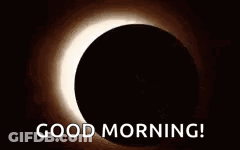 A Partial Eclipse Of The Sun With The Words `` Good Morning '' Written In Front Of It . GIF