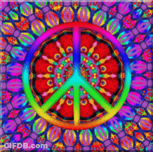 A Peace Sign Is Surrounded By A Colorful Kaleidoscope GIF