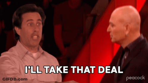 A Peacock Ad Shows Two Men Shaking Hands And Says I 'Ll Take That Deal GIF