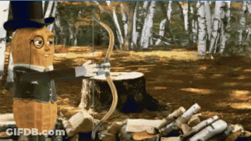 A Peanut In A Top Hat Is Holding A Bow And Arrow In A Forest GIF