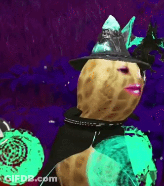 A Peanut Is Wearing A Witch Hat And A Black Cape GIF