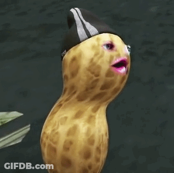 A Peanut With A Pink Lip And A Black Hat On . GIF