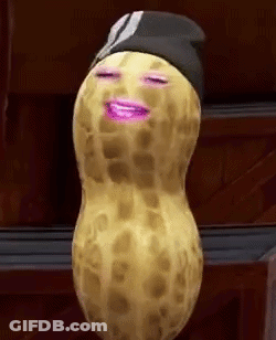 A Peanut With A Purple Face Is Wearing A Black Hat And Smiling . GIF