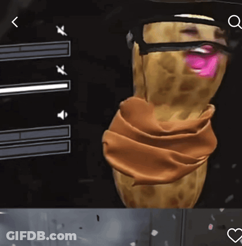 A Peanut With A Scarf Around Its Neck And A Pink Mouth GIF