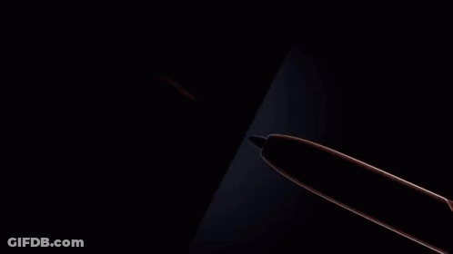 A Pen Is Being Used To Write On A Cell Phone Screen GIF