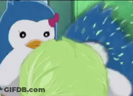 A Penguin And A Hedgehog Are Playing With A Green Leaf GIF
