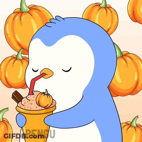 A Penguin Drinking A Milkshake With A Pumpkin In It GIF