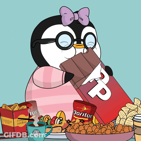 A Penguin Eating A Bar Of Chocolate Next To A Bag Of Doritos Chips GIF