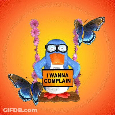 A Penguin Holding A Sign That Says " I Wanna Complain " GIF