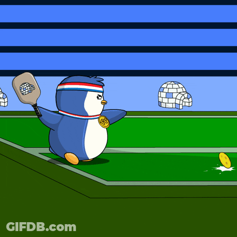 A Penguin Is Holding A Tennis Racquet And Wearing A Medal That Says ' Sd ' On It GIF