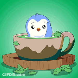 A Penguin Is In A Cup Of Green Tea GIF