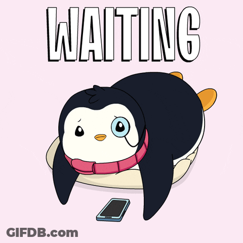 A Penguin Is Laying On A Pillow With A Cell Phone And The Word Waiting Behind It GIF
