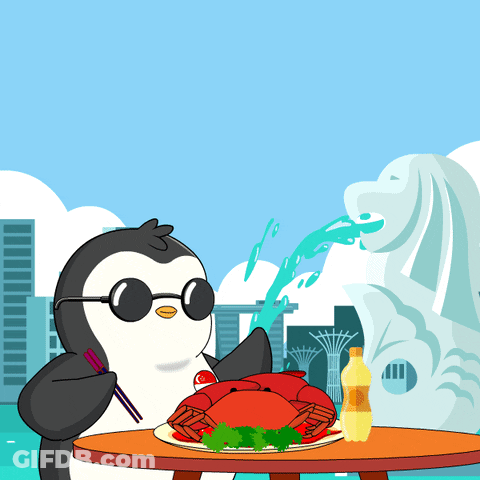 A Penguin Is Sitting At A Table With A Plate Of Food And A Bottle Of Beer GIF