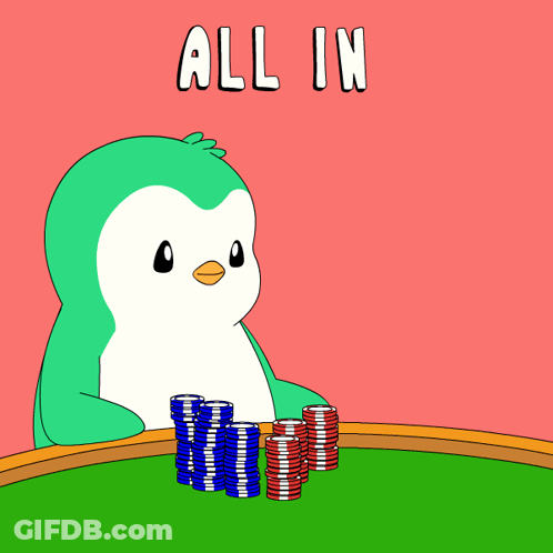 A Penguin Is Sitting At A Table With Stacks Of Poker Chips And Says All In GIF