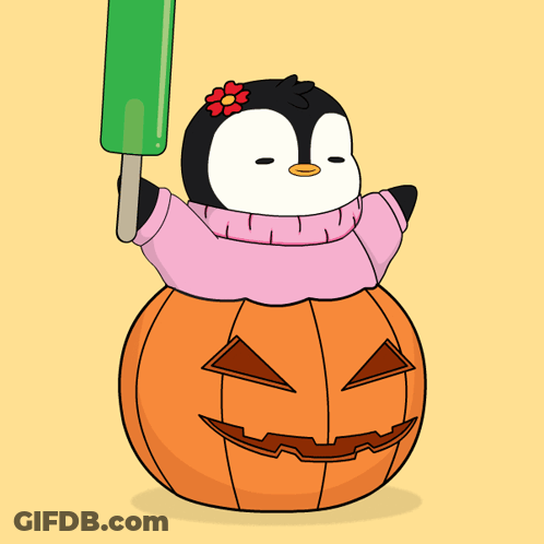 A Penguin Is Sitting On Top Of A Pumpkin And Holding A Green Popsicle GIF