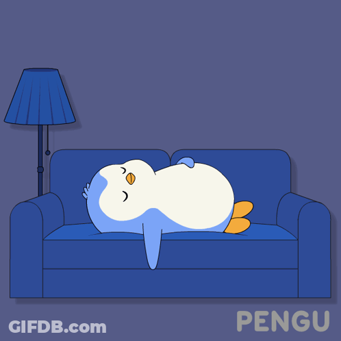 A Penguin Is Sleeping On A Blue Couch With The Words Goodnight Penguin Below It GIF