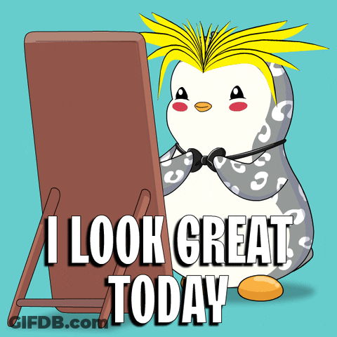 A Penguin Is Standing In Front Of A Mirror With The Words I Look Great Today Below It GIF