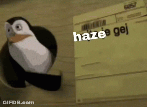 A Penguin Is Standing Next To A Piece Of Paper That Says `` Haze E Gej '' . GIF