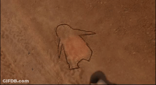 A Penguin Is Standing On The Ground Holding A Piece Of Paper With A Red Spot On It . GIF