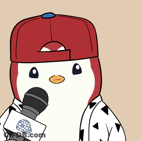 A Penguin Is Wearing A Red Hat And Holding A Microphone With A Globe On It GIF