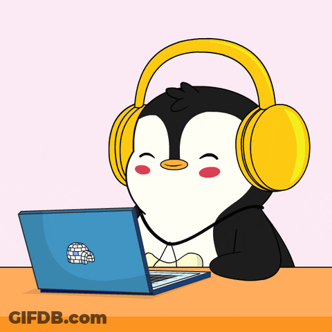 A Penguin Is Wearing Headphones And Using A Laptop GIF