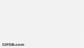A Penguin Sits In A Corner Of A Room With A Drawing Of A Robot And The Words " Little People " On The Wall GIF