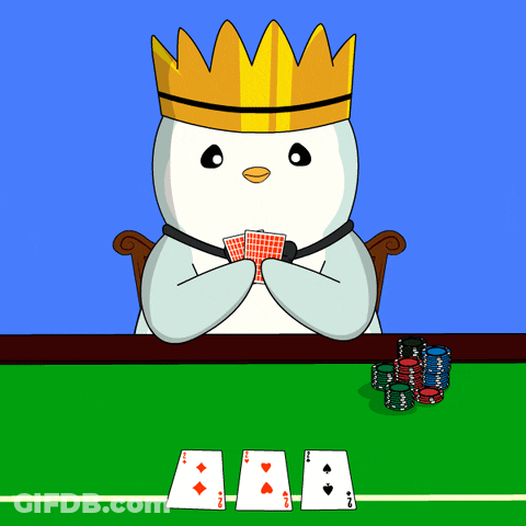 A Penguin Wearing A Crown And A Bow Tie Is Playing Poker GIF