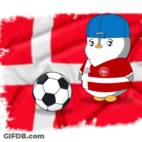 A Penguin Wearing A Dbu Jersey Stands In Front Of A Soccer Ball GIF