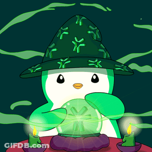 A Penguin Wearing A Green Wizard Hat Holds A Crystal Ball GIF