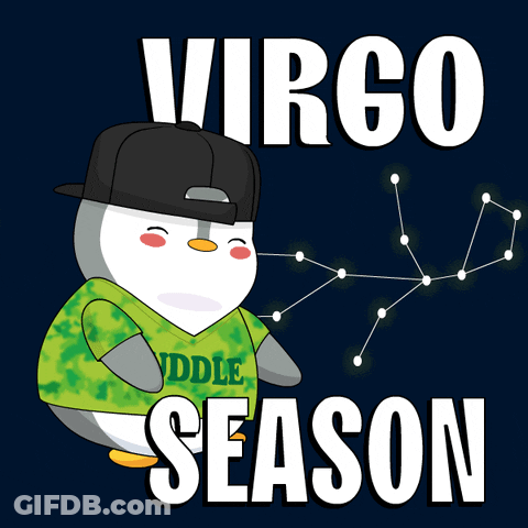 A Penguin Wearing A Hat And A Green Shirt That Says Huddle On It GIF