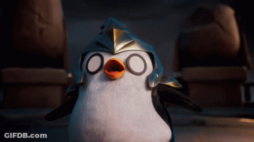 A Penguin Wearing A Helmet With Circles On It 'S Eyes GIF