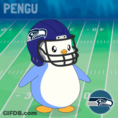 A Penguin Wearing A Seattle Seahawks Football Helmet GIF