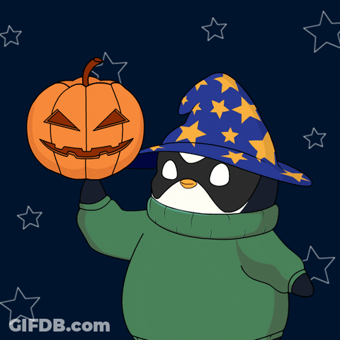 A Penguin Wearing A Wizard Hat Holds Up A Pumpkin GIF