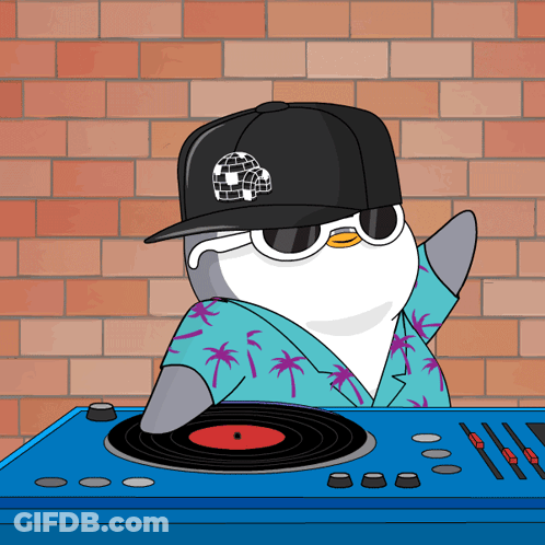 A Penguin Wearing Sunglasses And A Hat Is Standing Behind A Record Player GIF