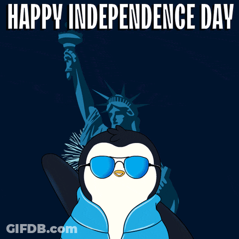 A Penguin Wearing Sunglasses Stands In Front Of The Statue Of Liberty And Fireworks With The Words Happy Independence Da GIF
