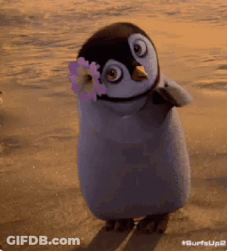 Penguin With Flower Walking On Beach GIF