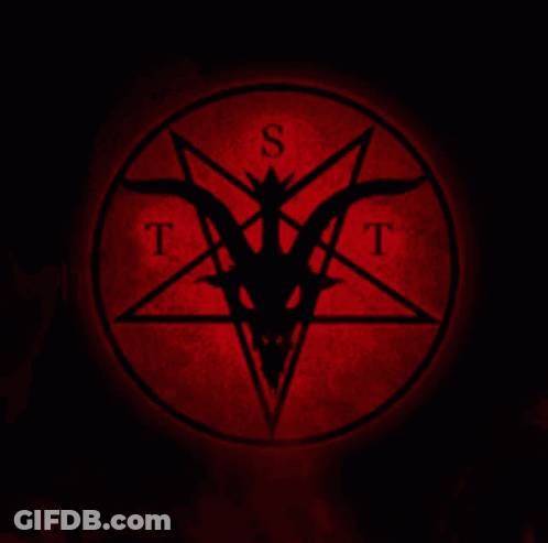A Pentagram With A Goat 'S Head And The Letter T GIF