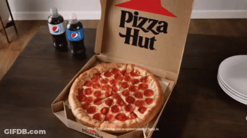 A Pepperoni Pizza In A Pizza Hut Box On A Table GIF